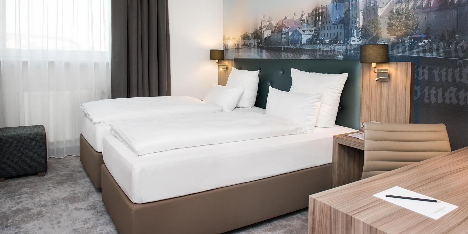 Economy Zimmer ACHAT Hotel Regensburg im Park Betten